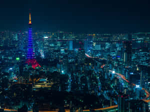 夜晚的東京城市景觀，閃耀的東京塔和霓虹燈。 — 夜景城市 壁紙
