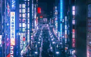 東京夜晚霓虹燈光的街道，人群和發光招牌。 — 日本 壁紙