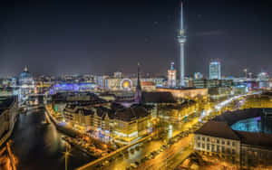 柏林夜景，建築物和河流在星空下閃耀。 — 惡魔城 壁紙