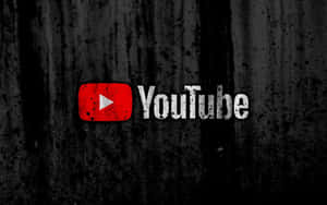 深色紋理背景上帶有飛濺效果的 YouTube 標誌。
