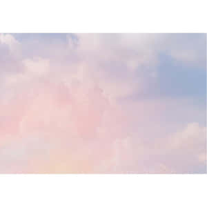 粉彩粉紅、薰衣草紫和藍色雲朵在寧靜的天空中飄動。