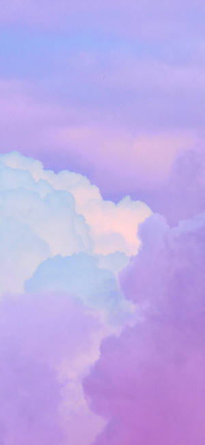 寧靜暮色天空中的粉彩紫色和藍色雲朵。 — 雲朵 壁紙
