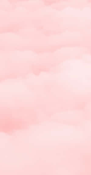 夢幻水彩天空中的柔和粉紅雲朵
