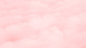 粉紅雲朵漂浮在柔和夢幻的天空中