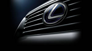 Lexus 汽車格柵標誌在黑暗的工作室環境中以藍色燈光照明