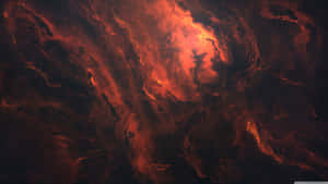 在黑暗虛空中發光的火紅與橙色雲朵的宇宙漩渦。