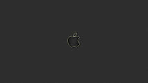 帶有金色輪廓的Apple標誌，置於深灰色紋理背景上