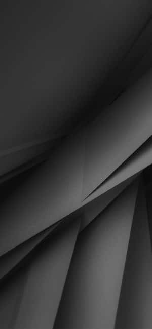 抽象單色布料褶皺，帶有柔和陰影與光滑質感。 — OnePlus 13 壁紙