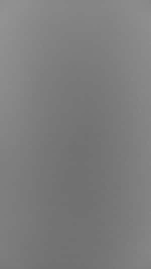 純色灰色紋理背景，帶有微妙漸變，適合設計用途。 — 灰色美學 GIF 壁紙