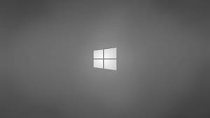 Windows標誌在灰色漸變背景上柔和發光 — Cia標誌 壁紙