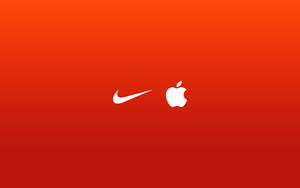 白色Nike和Apple標誌在紅色漸變背景上