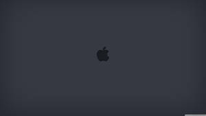深灰色背景，中央有Apple標誌