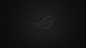 帶有紋理的黑色背景上的深色 ROG 遊戲標誌