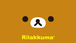 Rilakkuma 卡通熊標誌在橙色背景上，帶有黃色文字。