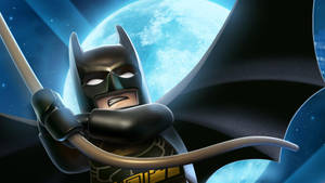 LEGO Batman 披著斗篷，手持警棍，背景是帶有巨大藍月的星空夜空。