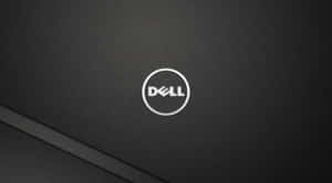Dell筆記型電腦蓋的近距離特寫，黑色表面上有銀色標誌。