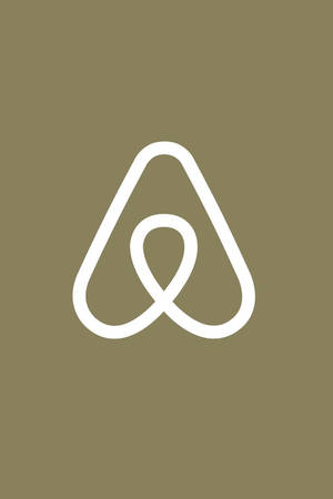 白色Airbnb標誌在橄欖綠背景上