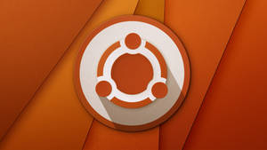 橙色幾何背景上的 Ubuntu 標誌