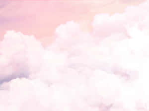 夢幻水彩天空中的粉紅色和白色雲朵。