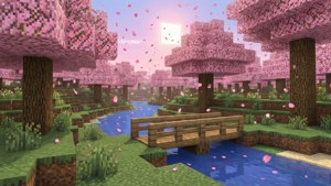 在Minecraft中，櫻花樹飄落的花瓣環繞著日落時分河流上的一座木橋。