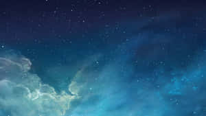 星空，有發光的藍色星雲雲團和散落的星星。