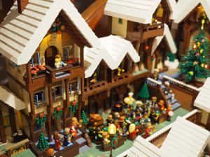 LEGO冬季村莊，有積雪覆蓋的屋頂和節日燈光。