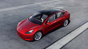 紅色Tesla Model 3電動車停泊在瀝青停車場 — Tesla GIF 壁紙