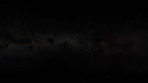 銀河系在黑暗的夜空中閃耀著星光。 — 星星 壁紙