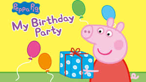 Peppa Pig 手持生日禮物，附近有彩色氣球漂浮。