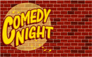 紅磚牆上的 Comedy Night 標誌，帶有黃色油漆飛濺。