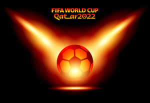 發光足球帶有火熱光線和FIFA World Cup Qatar 2022文字。