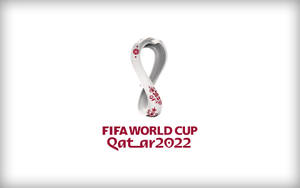 FIFA 世界盃卡塔爾 2022 標誌，帶有無限符號和紅色花卉設計。