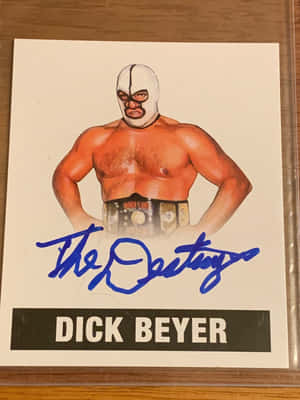 Dick Beyer戴面具手持冠軍腰帶的簽名摔角卡。