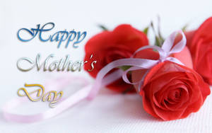 紅玫瑰配粉紅絲帶和 'Happy Mother's Day' 文字用於慶祝。
