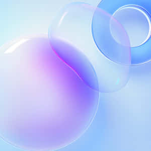 在柔和背景上漂浮的帶有紫色和藍色漸變的半透明氣泡。
