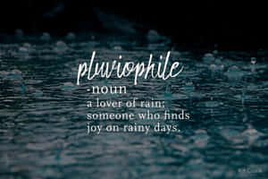 文字疊加將 pluviophile 定義為在黑暗的雨水表面上的雨水愛好者。
