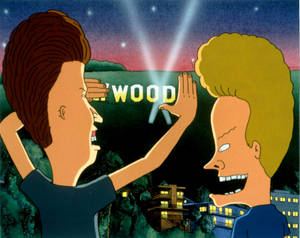 Beavis 和 Butthead 在夜晚的荷里活標誌下擊掌。