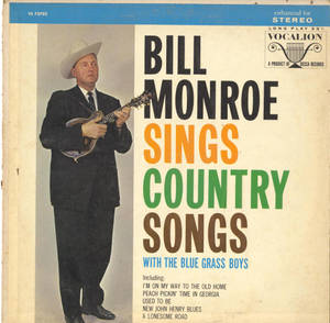 Bill Monroe 身穿西裝和牛仔帽，手持曼陀林，復古鄉村音樂專輯封面。 — 音樂 GIF 壁紙