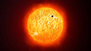 一顆行星在太空中經過一顆熾熱的太陽前方。 — 太空 壁紙
