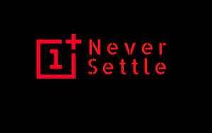 紅色 OnePlus 標誌和標語在黑色背景上。
