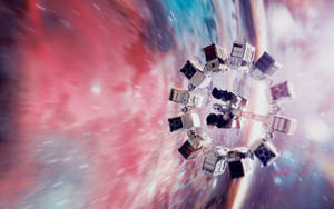 未來主義太空站在深空中環繞一個色彩繽紛的星雲。 — 太空人 壁紙