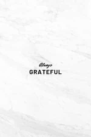 白色大理石背景，黑色文字寫著「Always GRATEFUL」