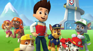 Paw Patrol 團隊在他們總部前合影，背後有山脈。