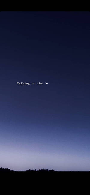 在黑暗樹線的暮色天空中，新月上方有文字寫著「Talking to the」。