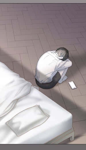 動漫男孩坐在床邊的地板上，看起來沮喪，手機在附近。