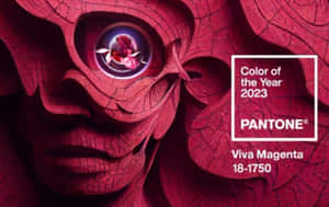 Pantone 2023 年度色彩 Viva Magenta 以風格化的紅色面孔和發光的眼睛呈現。