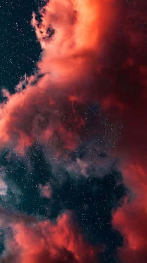 深空場景中的紅色宇宙雲和星星。