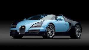 淺藍色和黑色Bugatti Veyron跑車在工作室燈光下。
