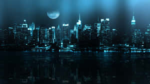 月光下的城市天際線，摩天大樓夜間倒映在水面上。 — Awesome GIF 壁紙