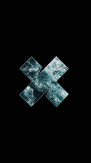 黑色背景上由海浪瓷磚組成的抽象X形狀